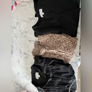 Francesca’s Bundle Clothes. Brand new petite XStwo black tops and a leopard top.